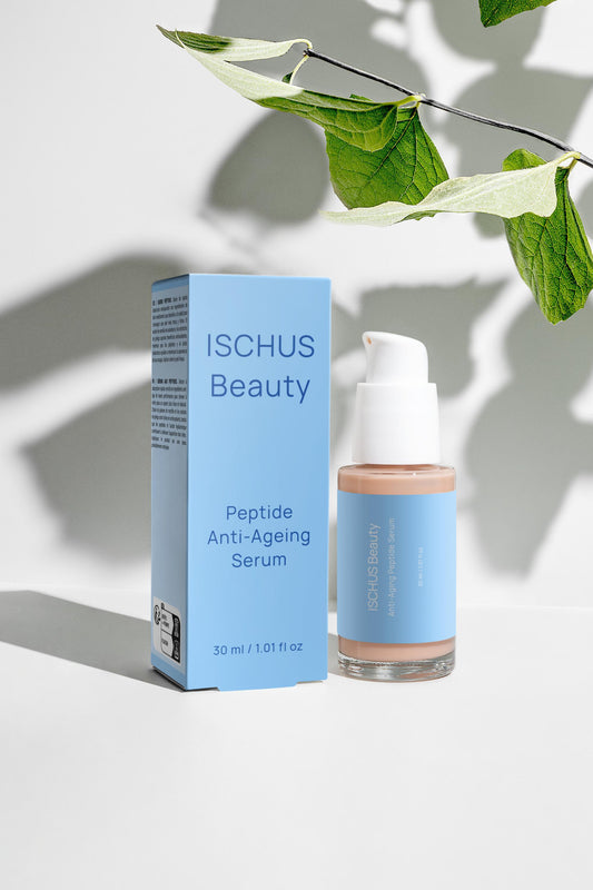 A light blue box and bottle of Anti-Ageing Peptide Serum (30 ml) are displayed on a white surface, with green leaves casting shadows, highlighting this advanced serum infused with hyaluronic acid.